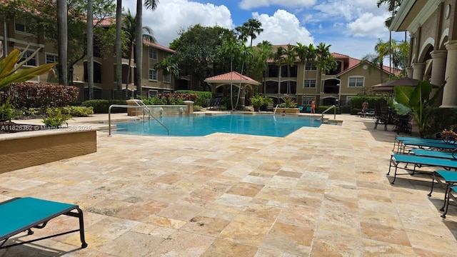 230 SW 117th Ter, Pembroke Pines, FL 33025 - community pool featuring a patio and a gazebo