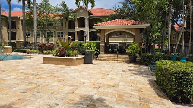 230 SW 117th Ter, Pembroke Pines, FL 33025 - view of community featuring a gazebo, a patio area, and a swimming pool