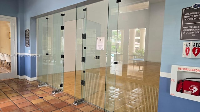230 SW 117th Ter, Pembroke Pines, FL 33025 - workout area featuring tile patterned floors