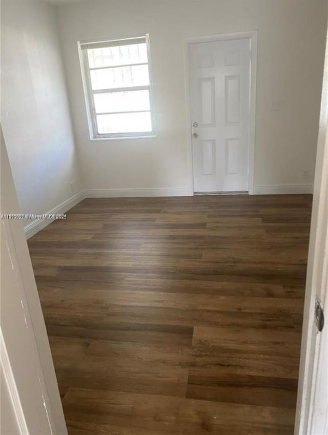 791 E 22nd St, Hialeah, FL 33013 - spare room featuring wood finished floors