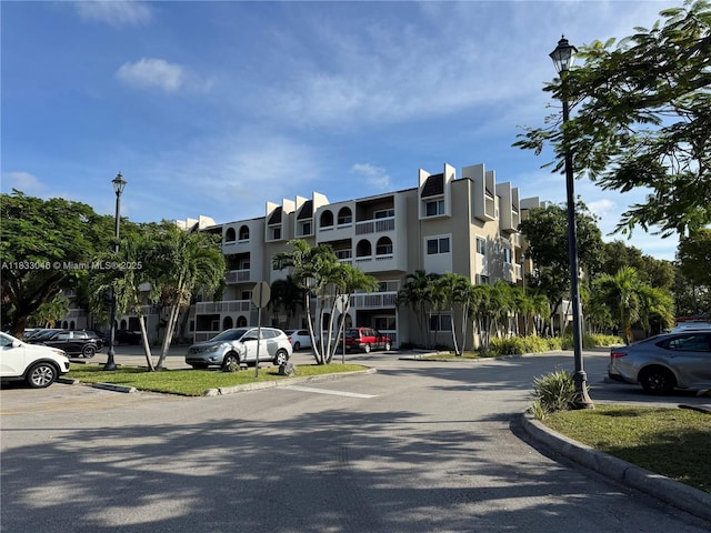 7915 Camino Real Unit N-302, Miami, FL 33143 - view of property featuring uncovered parking