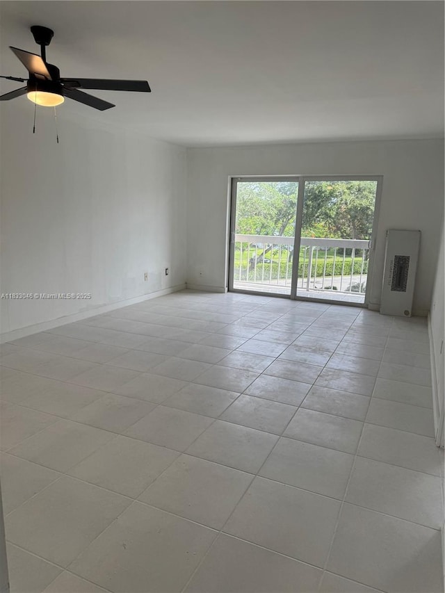 7915 Camino Real Unit N-302, Miami, FL 33143 - unfurnished room with light tile patterned floors and ceiling fan