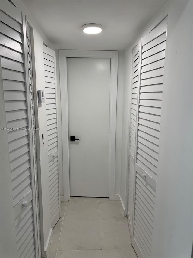 7915 Camino Real Unit N-302, Miami, FL 33143 - hall featuring light tile patterned flooring