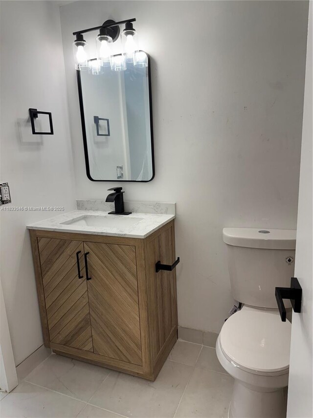 7915 Camino Real Unit N-302, Miami, FL 33143 - half bathroom featuring vanity and toilet