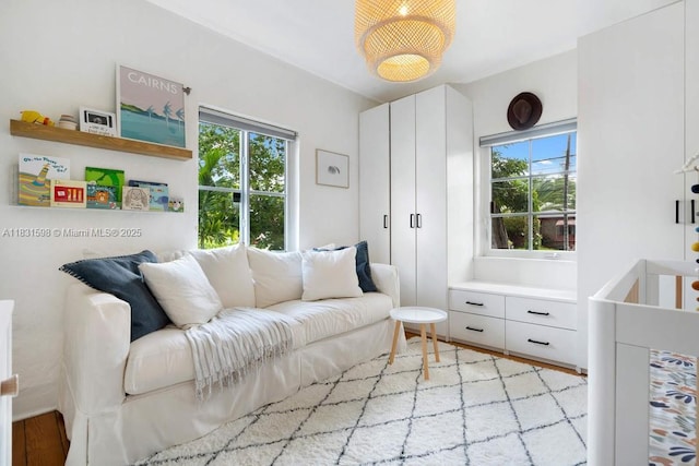 631 NE 87th St, Miami, FL 33138 - living area with healthy amount of natural light and light wood-type flooring