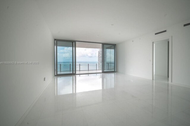 300 Biscayne Blvd Way Unit 4603, Miami, FL 33131 - unfurnished room with floor to ceiling windows and baseboards