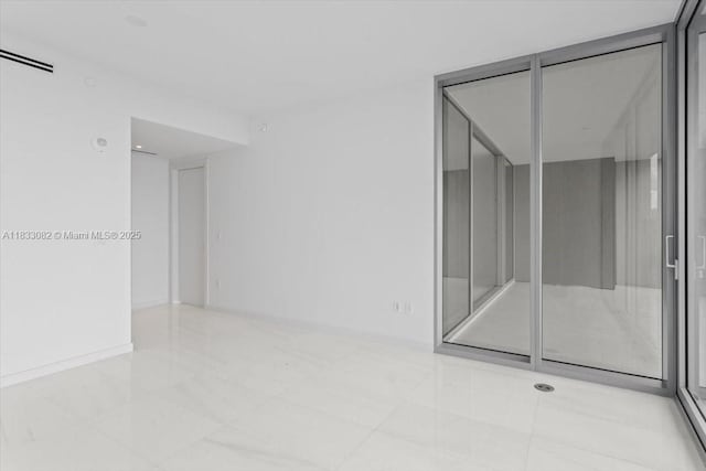 300 Biscayne Blvd Way Unit 4603, Miami, FL 33131 - spare room with tile patterned flooring