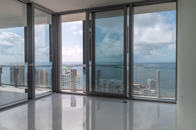 300 Biscayne Blvd Way Unit 4603, Miami, FL 33131 - tiled spare room with floor to ceiling windows and a water view