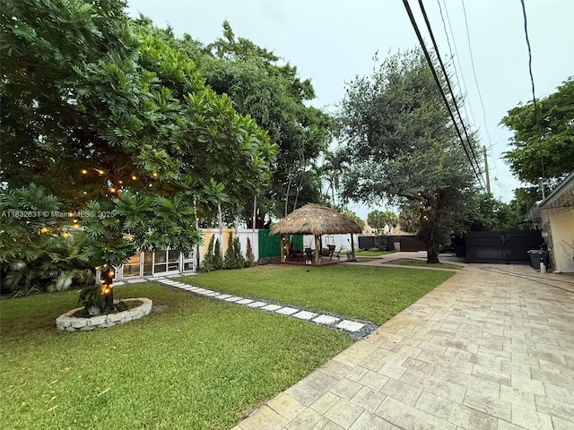 5838 Madison St, Hollywood, FL 33023 - fenced backyard with a gazebo and a patio area