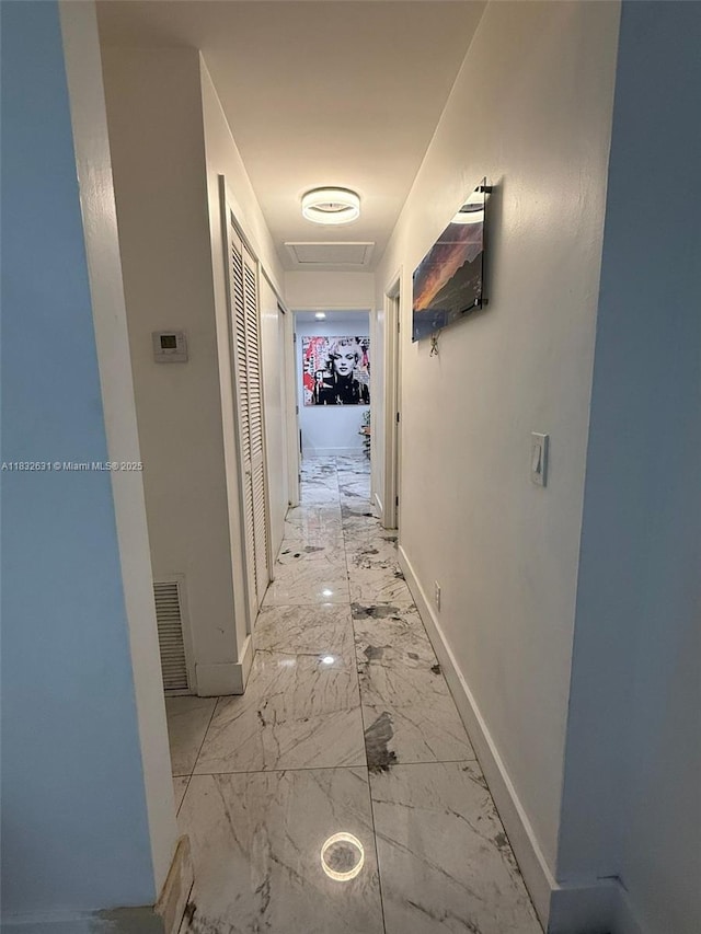 5838 Madison St, Hollywood, FL 33023 - corridor with marble finish flooring and attic access
