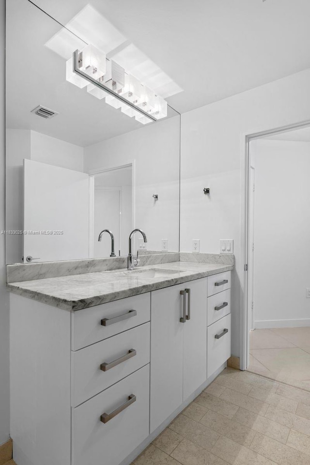 1111 SW 1st Ave Unit 2914-N, Miami, FL 33130 - bathroom with vanity and baseboards