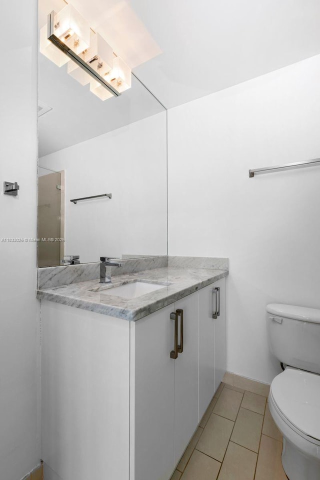 1111 SW 1st Ave Unit 2914-N, Miami, FL 33130 - bathroom with vanity and tile patterned floors