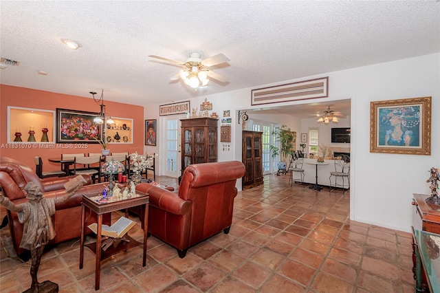 8445 SW 80th Pl, Miami, FL 33143 - living area featuring ceiling fan and a textured ceiling