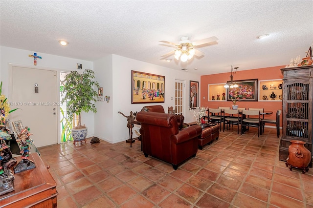 8445 SW 80th Pl, Miami, FL 33143 - living room with a textured ceiling and a ceiling fan