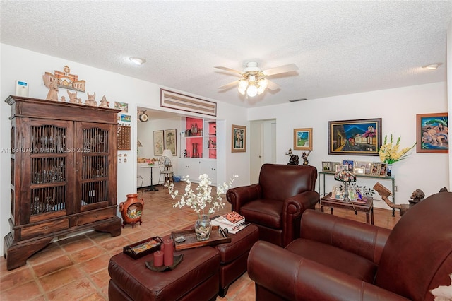 8445 SW 80th Pl, Miami, FL 33143 - living area featuring ceiling fan, a textured ceiling, and tile patterned floors