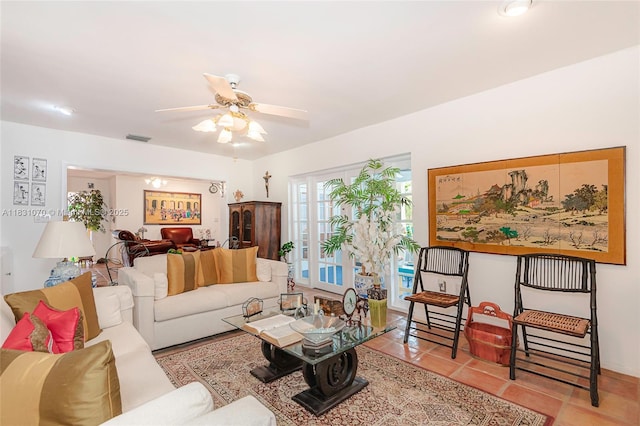 8445 SW 80th Pl, Miami, FL 33143 - tiled living room with a ceiling fan