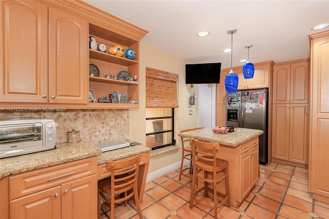 8445 SW 80th Pl, Miami, FL 33143 - kitchen featuring stainless steel refrigerator with ice dispenser, recessed lighting, backsplash, light brown cabinets, and open shelves