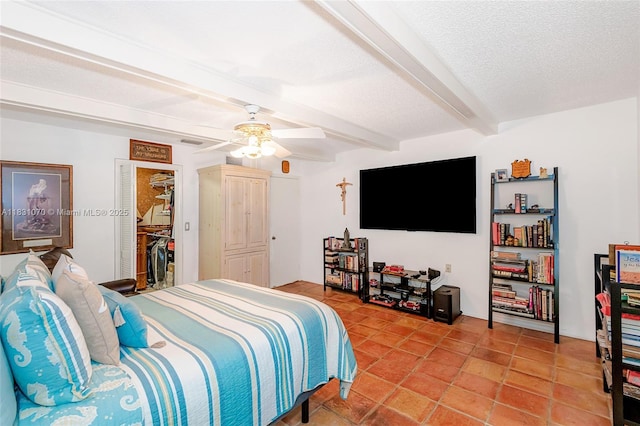 8445 SW 80th Pl, Miami, FL 33143 - bedroom with beamed ceiling, a ceiling fan, and a textured ceiling