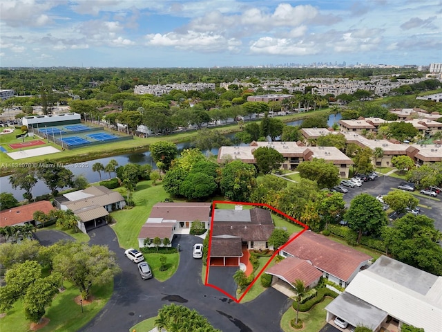 8445 SW 80th Pl, Miami, FL 33143 - aerial view of residential area with property boundaries highlighted and a large body of water
