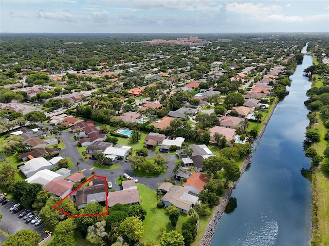 8445 SW 80th Pl, Miami, FL 33143 - aerial perspective of suburban area with property parcel outlined and a large body of water