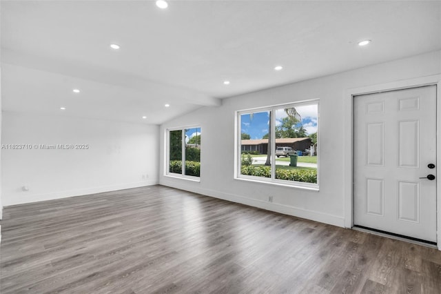 6117 NW 9th St, Margate, FL 33063 - unfurnished living room featuring wood finished floors and recessed lighting