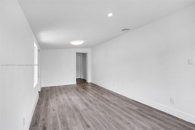 6117 NW 9th St, Margate, FL 33063 - unfurnished room featuring wood finished floors and recessed lighting