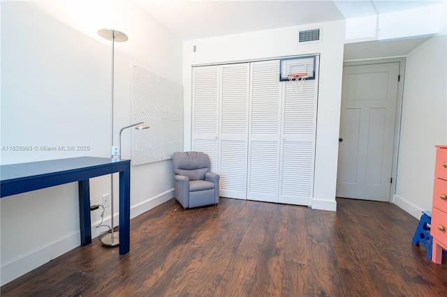 unfurnished room with wood finished floors