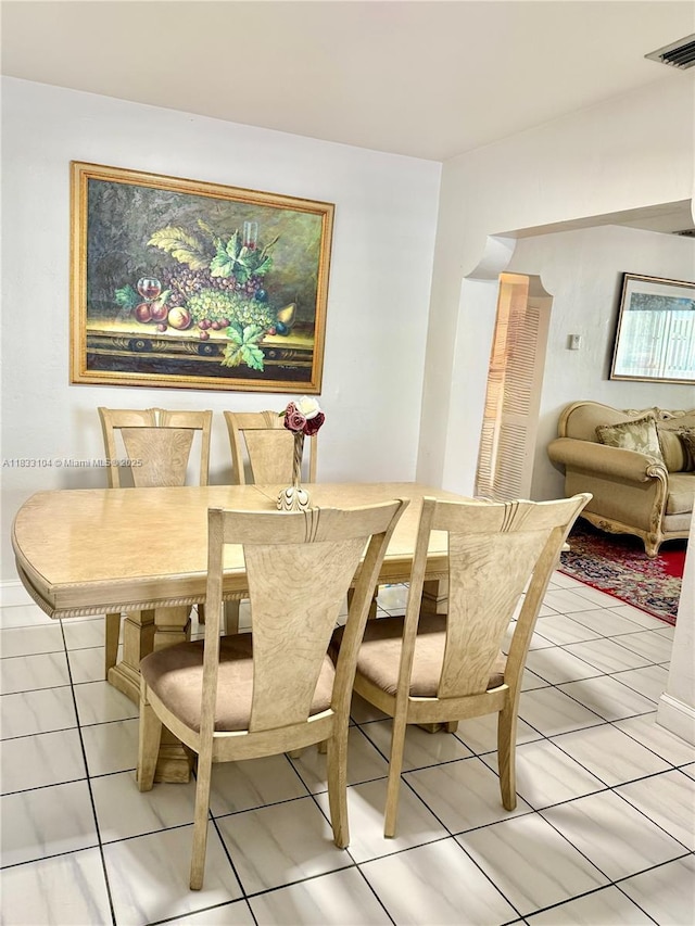 2145 SW 26th St, Miami, FL 33133 - dining area with light tile patterned floors