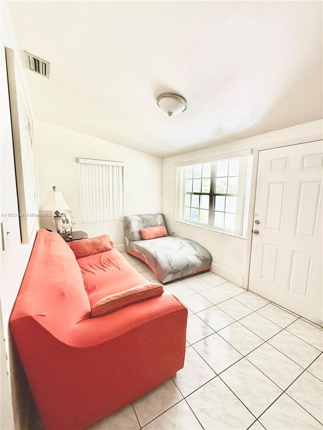 2145 SW 26th St, Miami, FL 33133 - living room with light tile patterned floors
