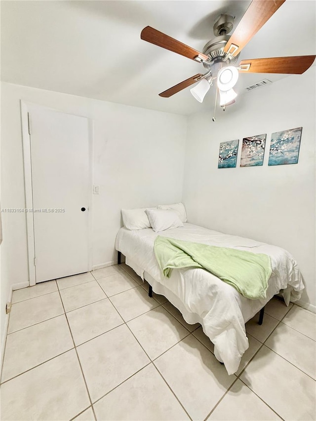 2145 SW 26th St, Miami, FL 33133 - bedroom featuring light tile patterned floors and ceiling fan