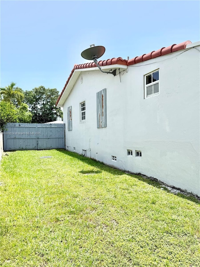 2145 SW 26th St, Miami, FL 33133 - back of house featuring a tiled roof