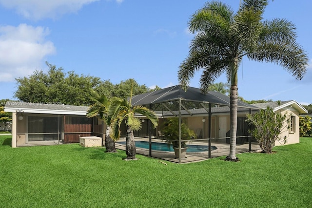 15471 SW 83rd Ave, Palmetto Bay, FL 33157 - outdoor pool with a yard and a lanai