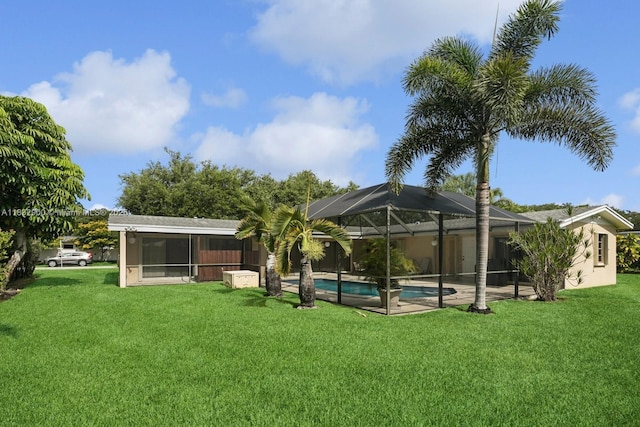 15471 SW 83rd Ave, Palmetto Bay, FL 33157 - view of grassy yard with an outdoor pool and a lanai