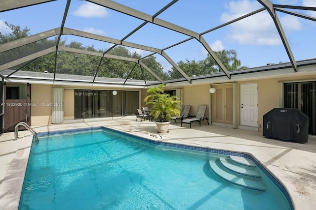 15471 SW 83rd Ave, Palmetto Bay, FL 33157 - swimming pool featuring a patio area and glass enclosure