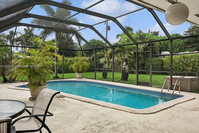 15471 SW 83rd Ave, Palmetto Bay, FL 33157 - swimming pool featuring a patio area, glass enclosure, and a yard