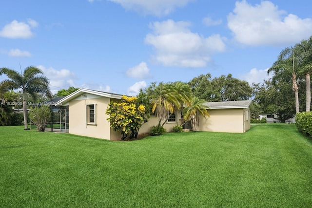 15471 SW 83rd Ave, Palmetto Bay, FL 33157 - back of property featuring stucco siding and a yard