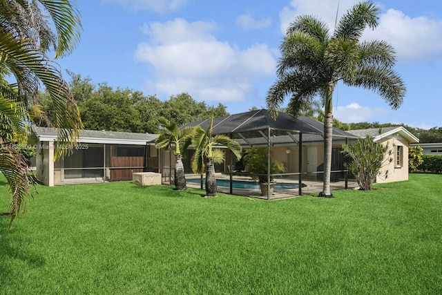 15471 SW 83rd Ave, Palmetto Bay, FL 33157 - view of green lawn featuring an outdoor pool and glass enclosure