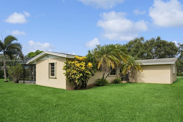 15471 SW 83rd Ave, Palmetto Bay, FL 33157 - rear view of house with stucco siding and a yard