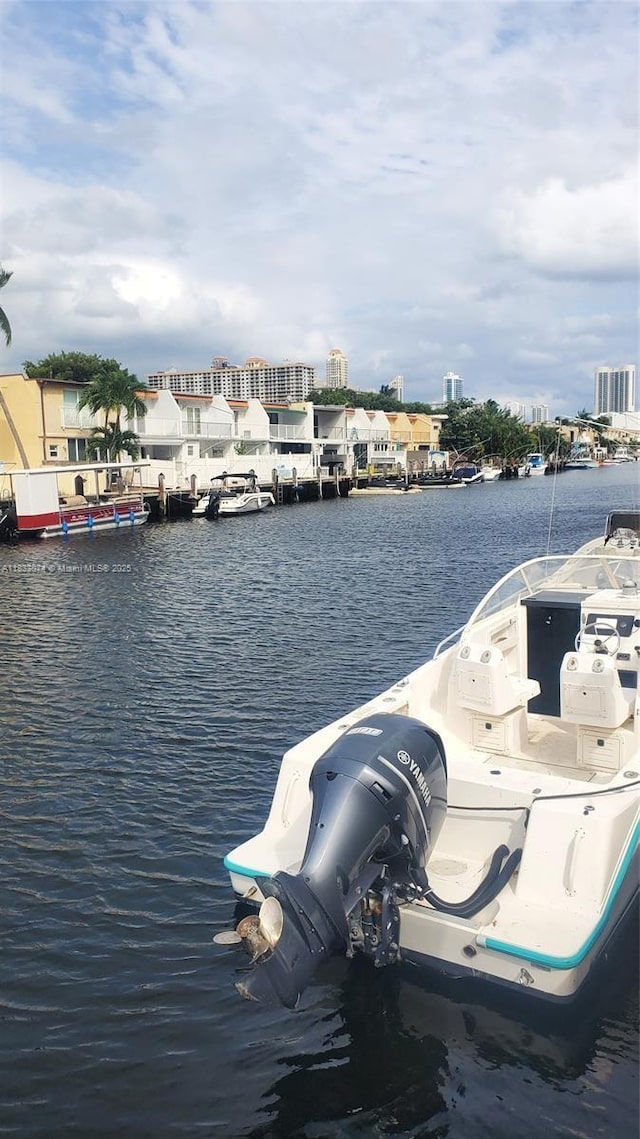 3703 NE 166th St Unit 905, North Miami Beach, FL 33160 - water view with a boat dock