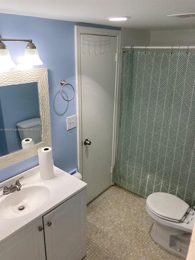 3703 NE 166th St Unit 905, North Miami Beach, FL 33160 - bathroom with vanity and a shower with curtain