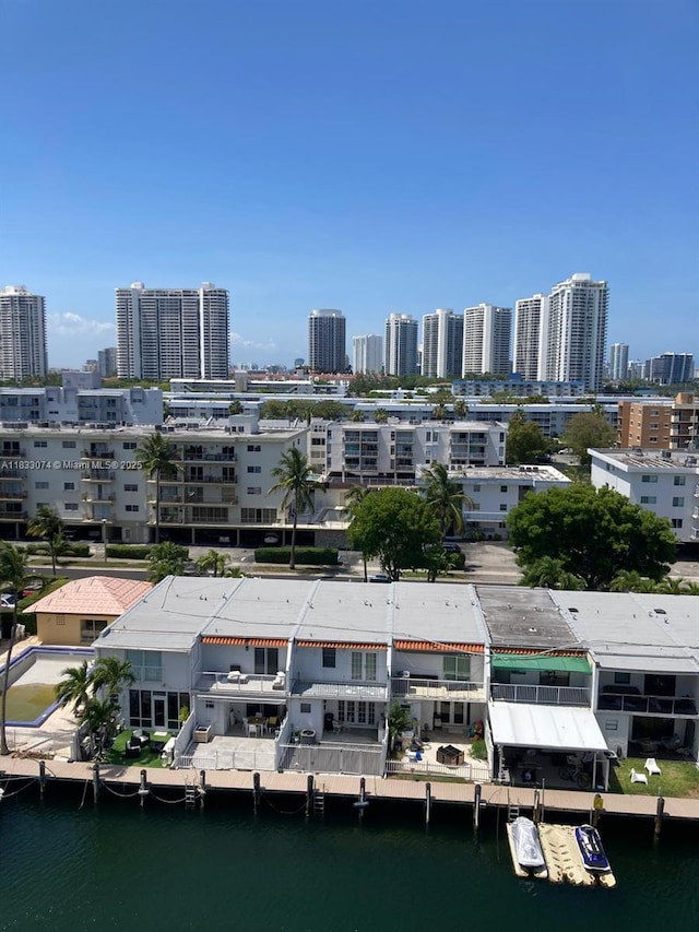 3703 NE 166th St Unit 905, North Miami Beach, FL 33160 - drone / aerial view of city skyline and a large body of water