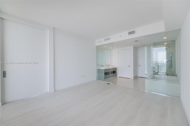 650 NE 32nd St Unit 4301, Miami, FL 33137 - unfurnished room featuring wood finished floors