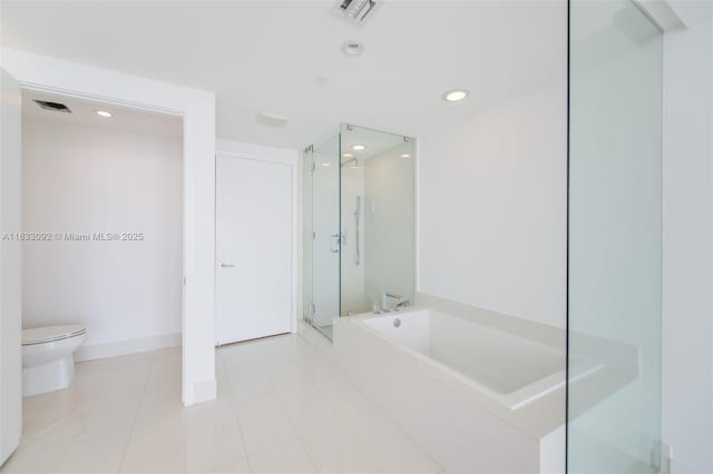 650 NE 32nd St Unit 4301, Miami, FL 33137 - bathroom featuring a shower stall, a bath, recessed lighting, and tile patterned floors