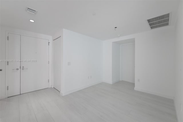 650 NE 32nd St Unit 4301, Miami, FL 33137 - spare room with light wood finished floors and recessed lighting