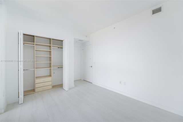 650 NE 32nd St Unit 4301, Miami, FL 33137 - unfurnished bedroom with a closet
