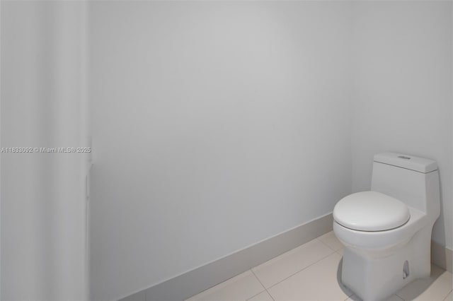 650 NE 32nd St Unit 4301, Miami, FL 33137 - bathroom featuring toilet and tile patterned floors