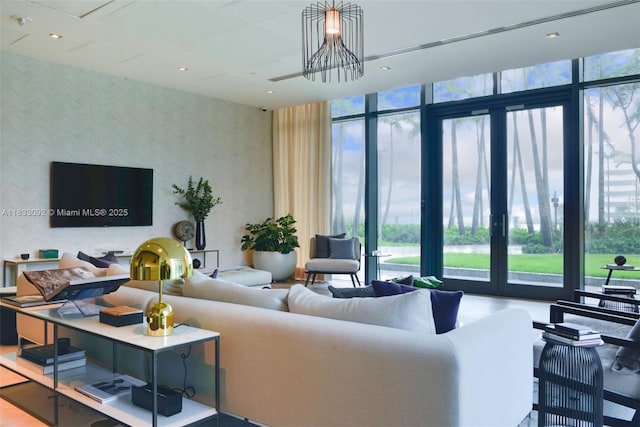 650 NE 32nd St Unit 4301, Miami, FL 33137 - living room featuring wallpapered walls and french doors