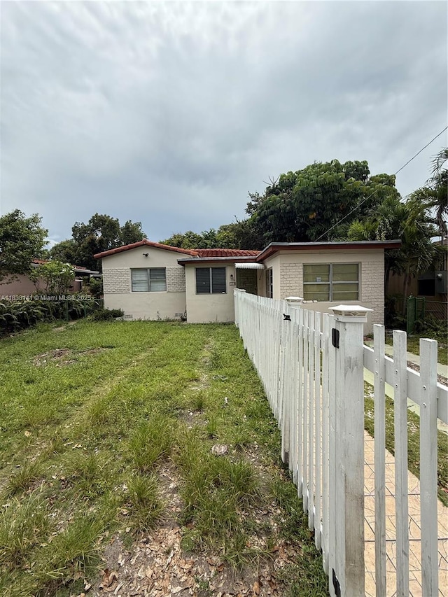 110 SW 64th Ct, Miami, FL 33144 - rear view of property with stucco siding