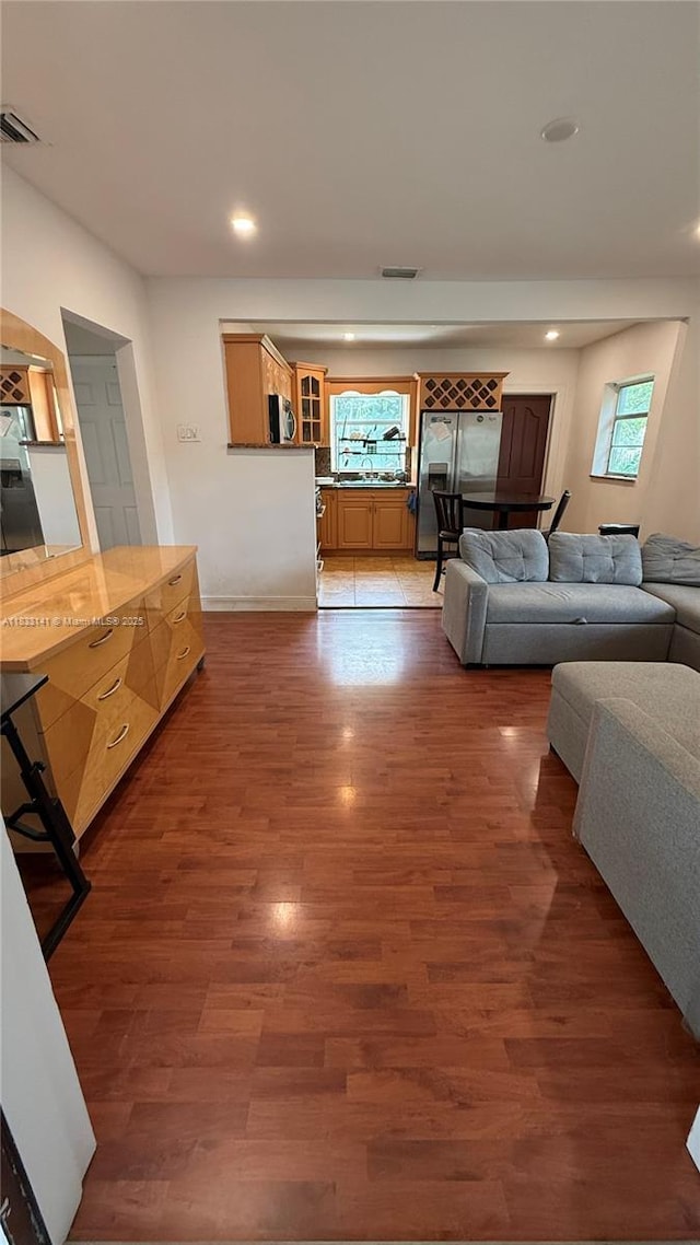 110 SW 64th Ct, Miami, FL 33144 - living room featuring light wood-type flooring and recessed lighting