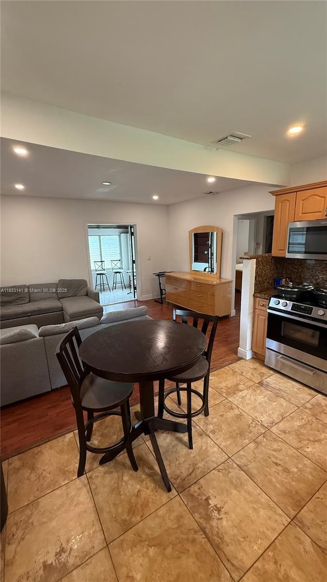 110 SW 64th Ct, Miami, FL 33144 - dining area featuring light tile patterned flooring and recessed lighting